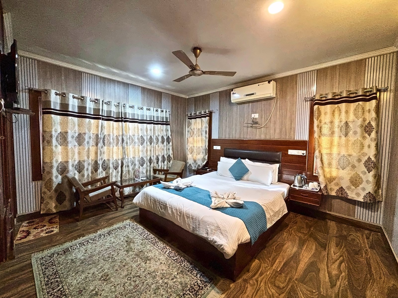 Deluxe Room with curtains and AC